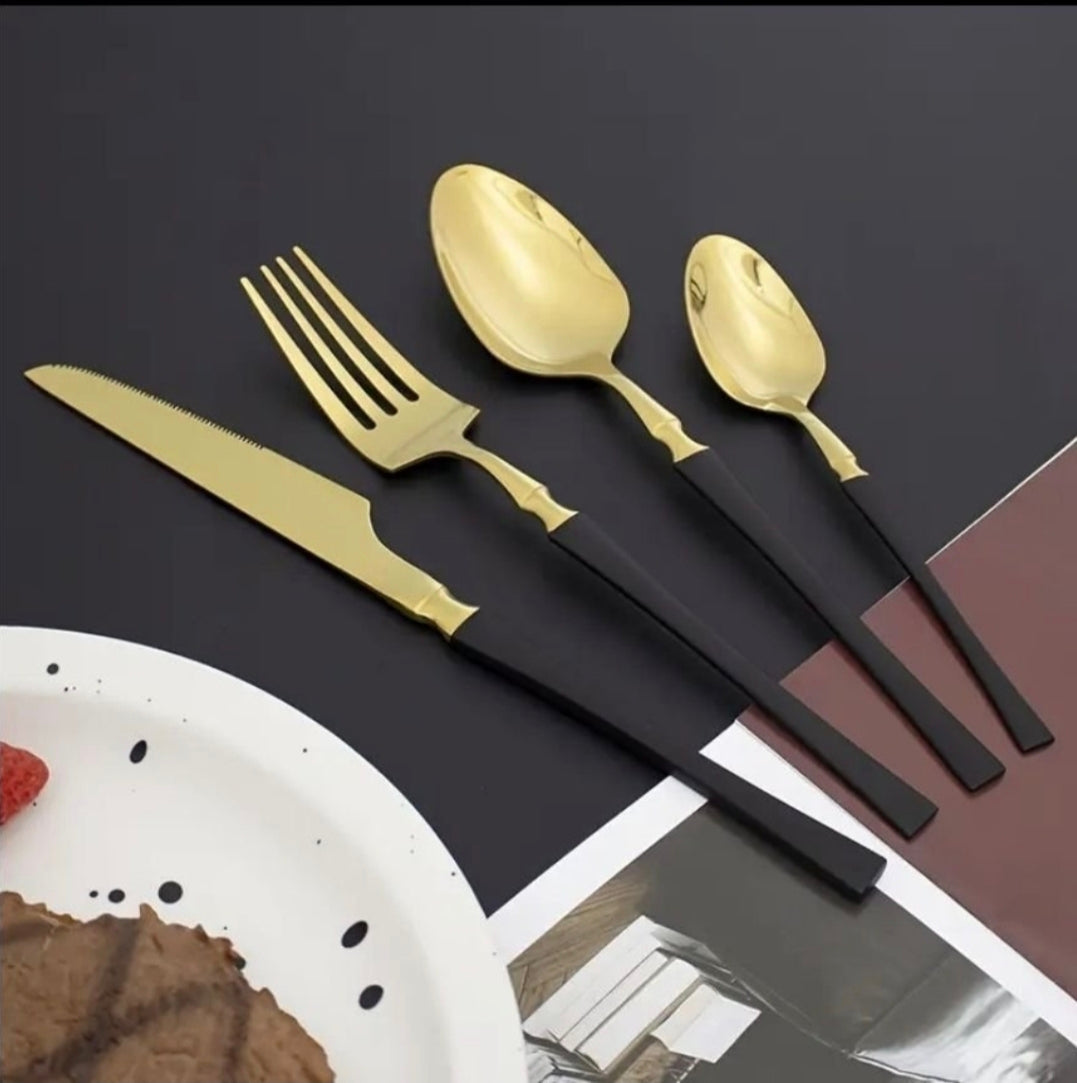 Elegant 24-delars bestickset i guld och svart – stilren dukning varje dag